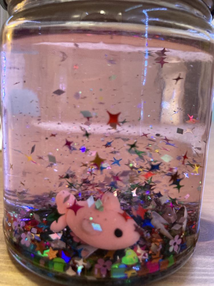 photo of jar with glitter inside